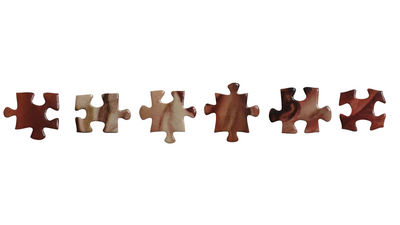 The Anatomy of a Puzzle: Defining Jigsaw Puzzle Pieces