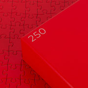 250 piece solid red puzzle